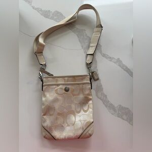 Coach Optic Signature Swingpack crossbody bag